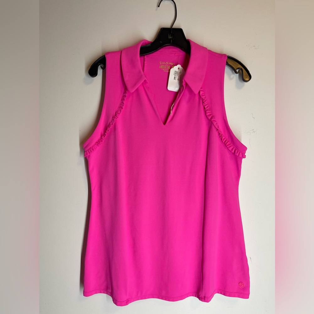 Never worn with tags. Lily Pulitzer golf or tennis shirt. Size Large.